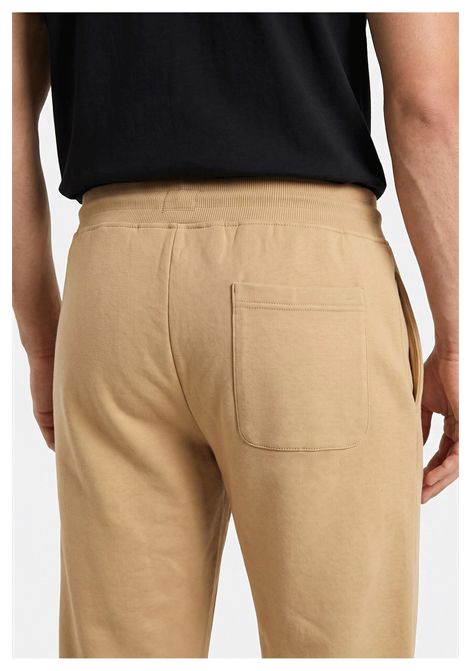 Pantaloni Tommy Hilfiger Slim S Flag Beige Uomo TOMMY HILFIGER | Pantaloni | DM0DM20473-ACA